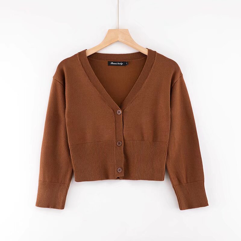 Woman wearing V-Neck Long Sleeve Short Cardigan in a casual setting