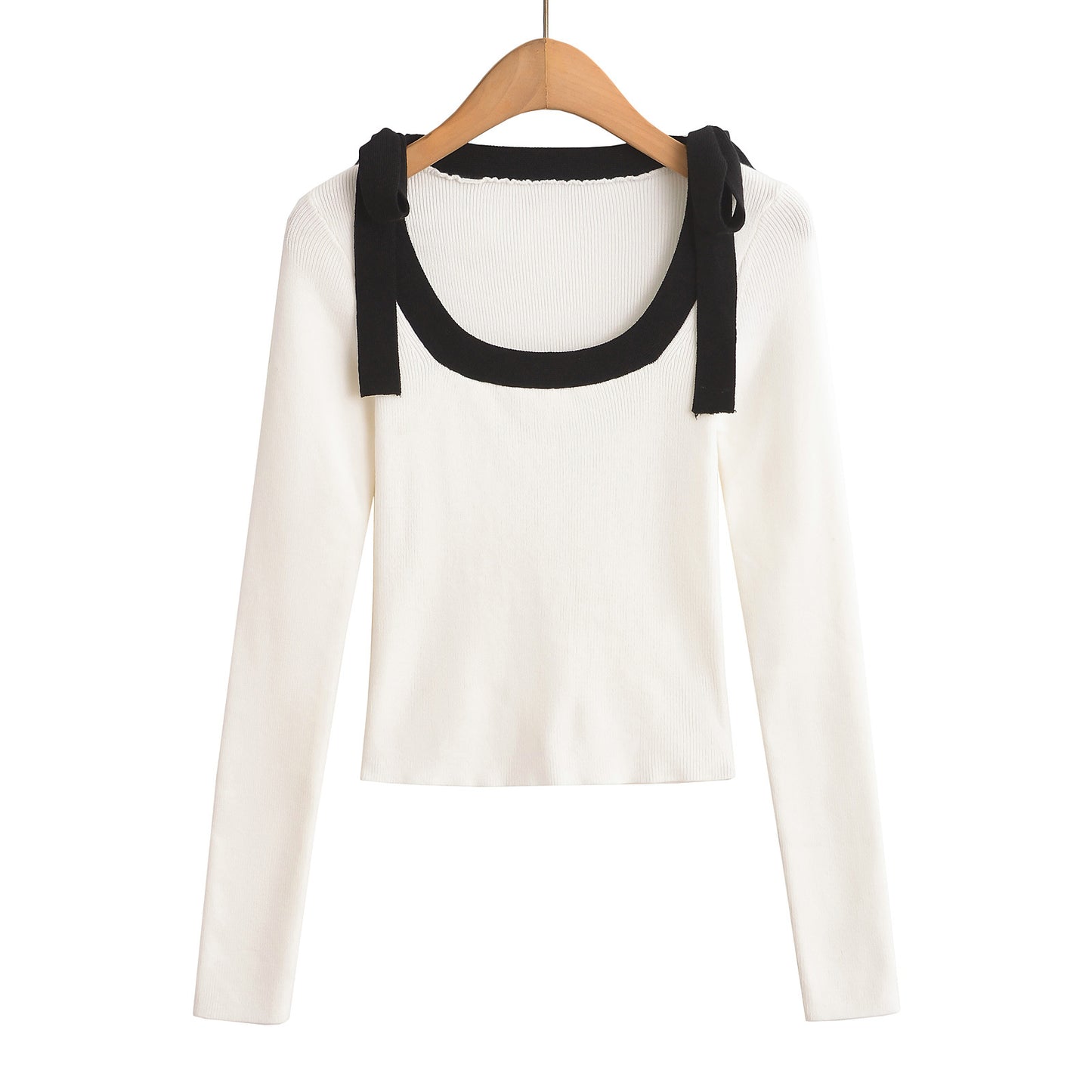 Woman wearing Square Neck Bow Ribbon Slim Fit Long Sleeve Sweater in a chic urban setting