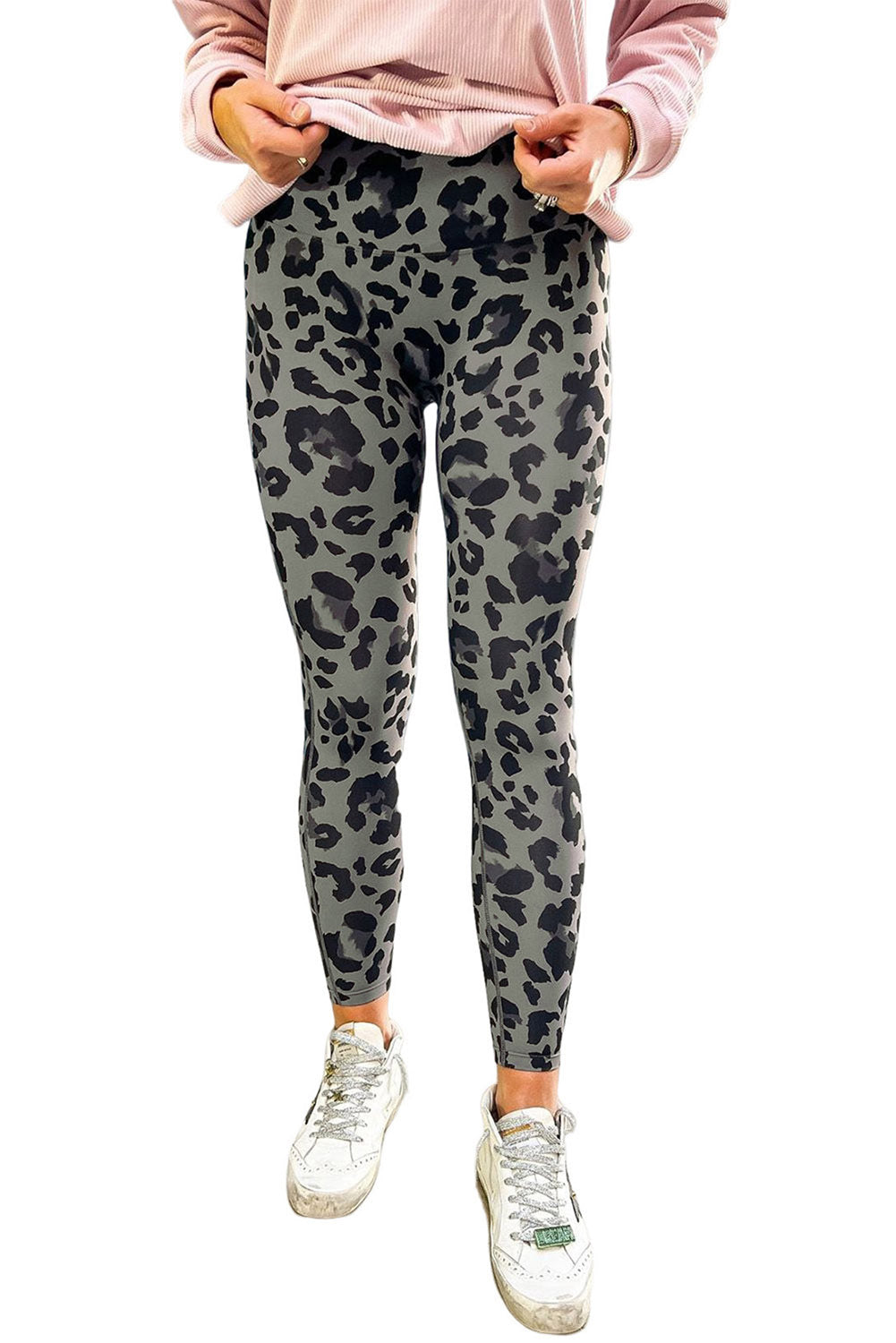 Woman wearing Classic Leopard Print Active Leggings in an urban setting