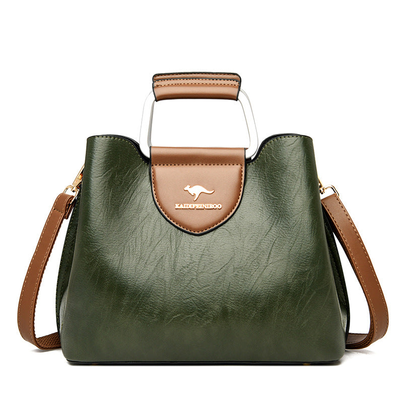Women's PU Leather Zipper Buckle Crossbody Shoulder Bucket Handbag – Model View | TajStylo