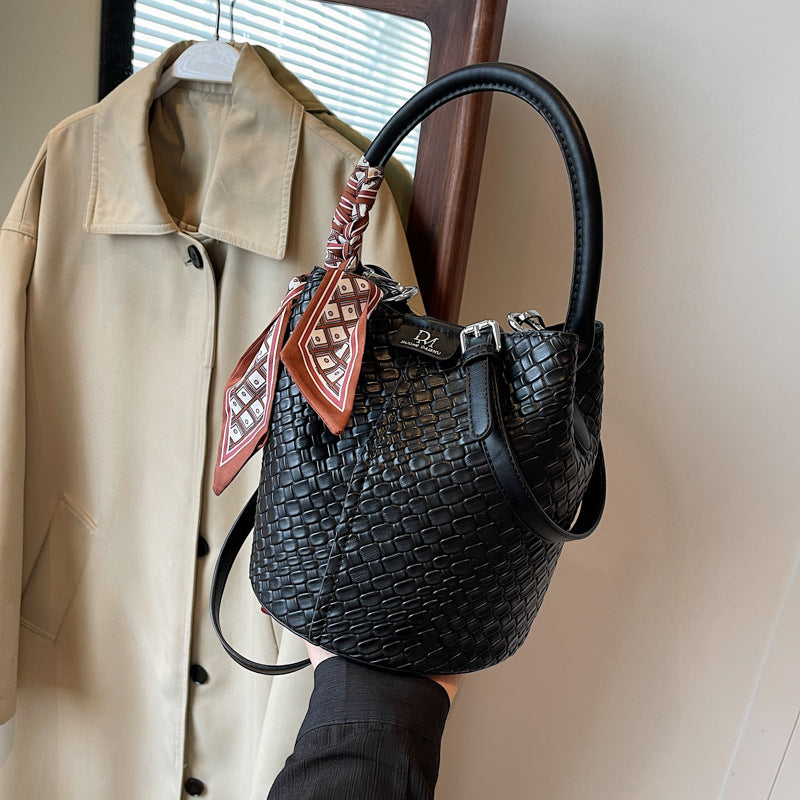 Women's Urban Minimalist PU Woven Magnetic Clasp Shoulder Bucket Bag – Model View | TajStylo