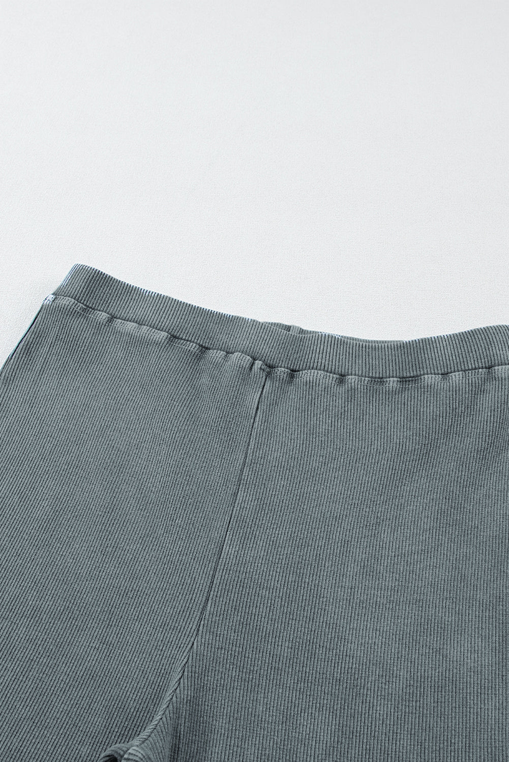 Woman wearing Dark Grey Vintage Wash Ribbed Leggings in a casual setting
