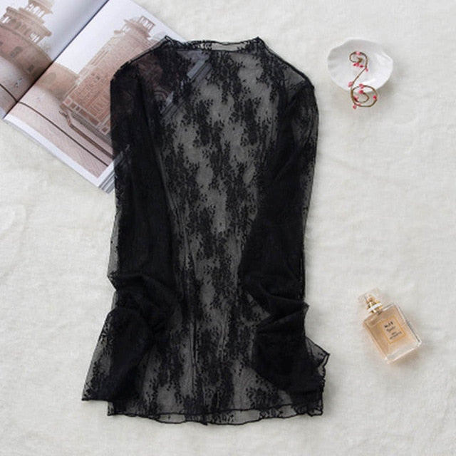 Woman wearing Transparent Korean Lace Blouse in a casual outdoor setting