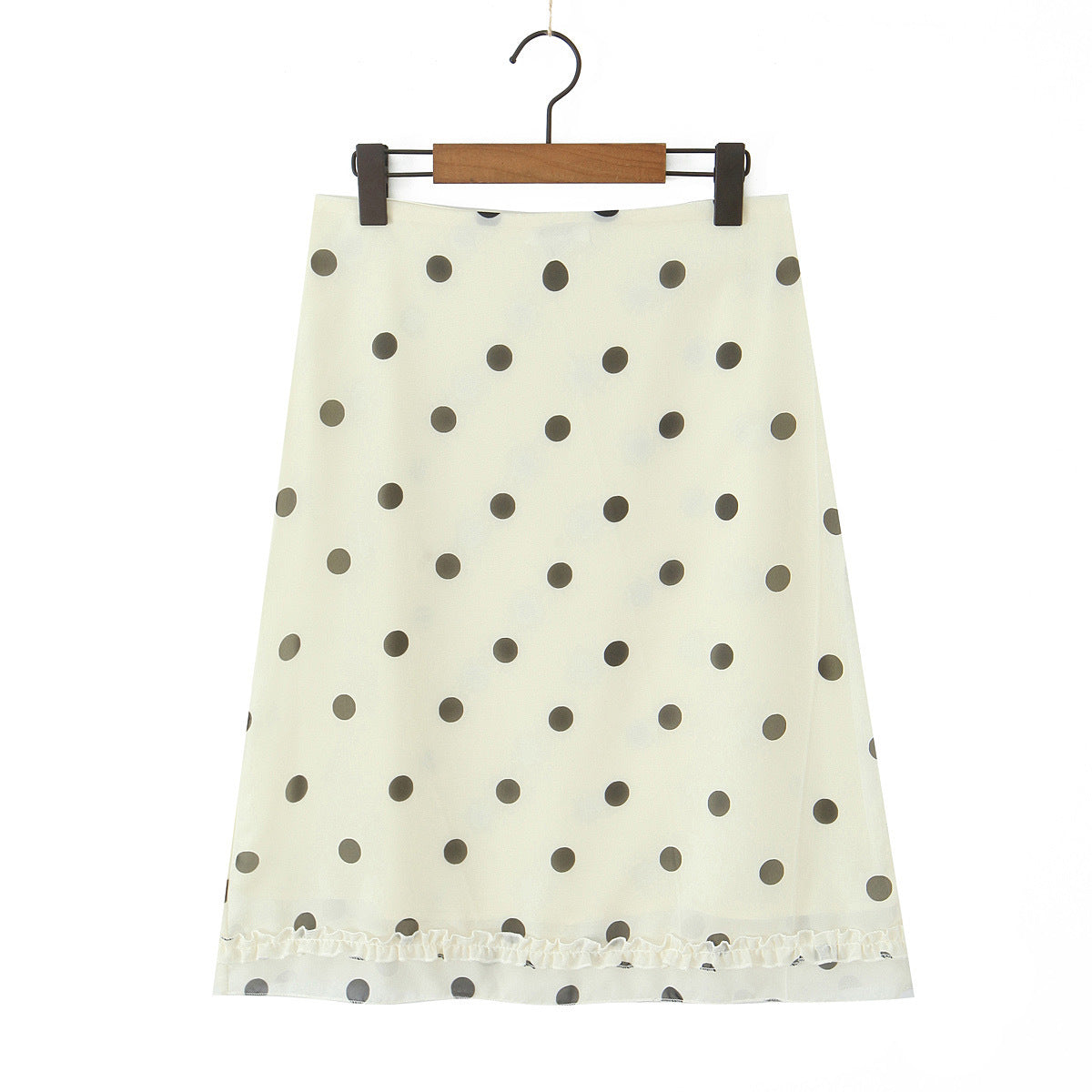 Woman wearing Wave Point Polka Dot Midi Skirt in a city setting