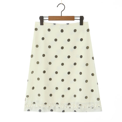 Woman wearing Wave Point Polka Dot Midi Skirt in a city setting