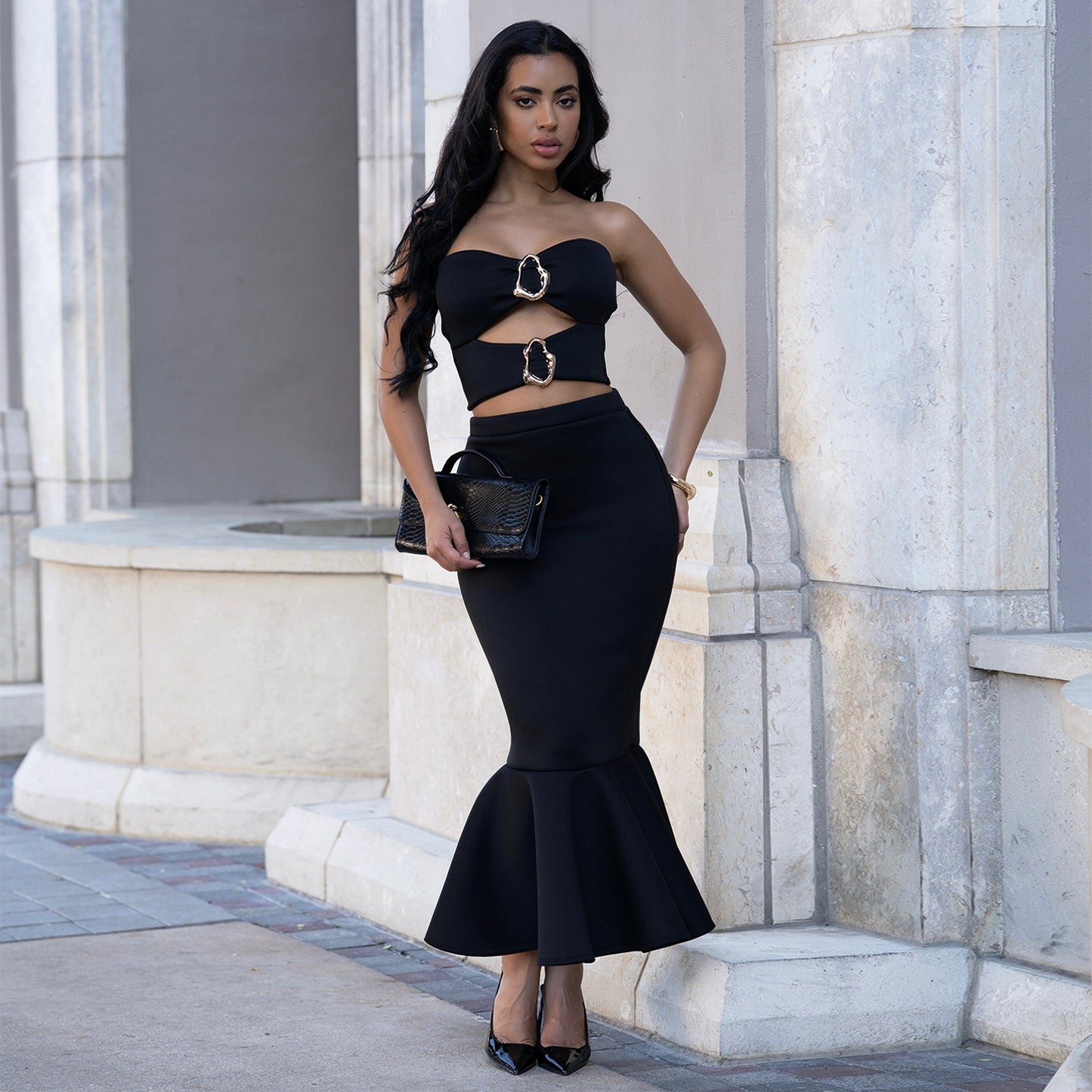 Woman wearing Strapless Lace Trim Top and Bodycon Skirt Set in an elegant evening setting