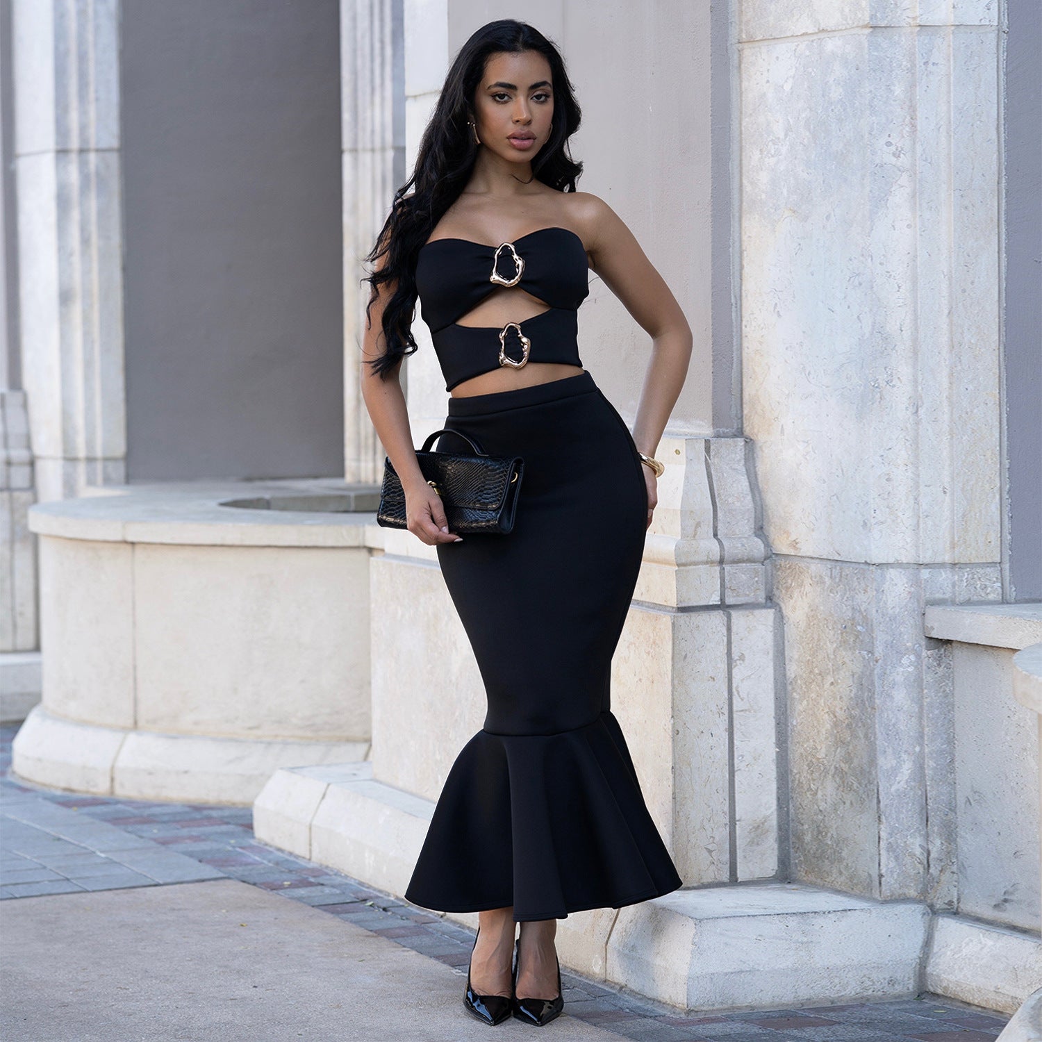 Woman wearing Strapless Lace Trim Top and Bodycon Skirt Set in an elegant evening setting