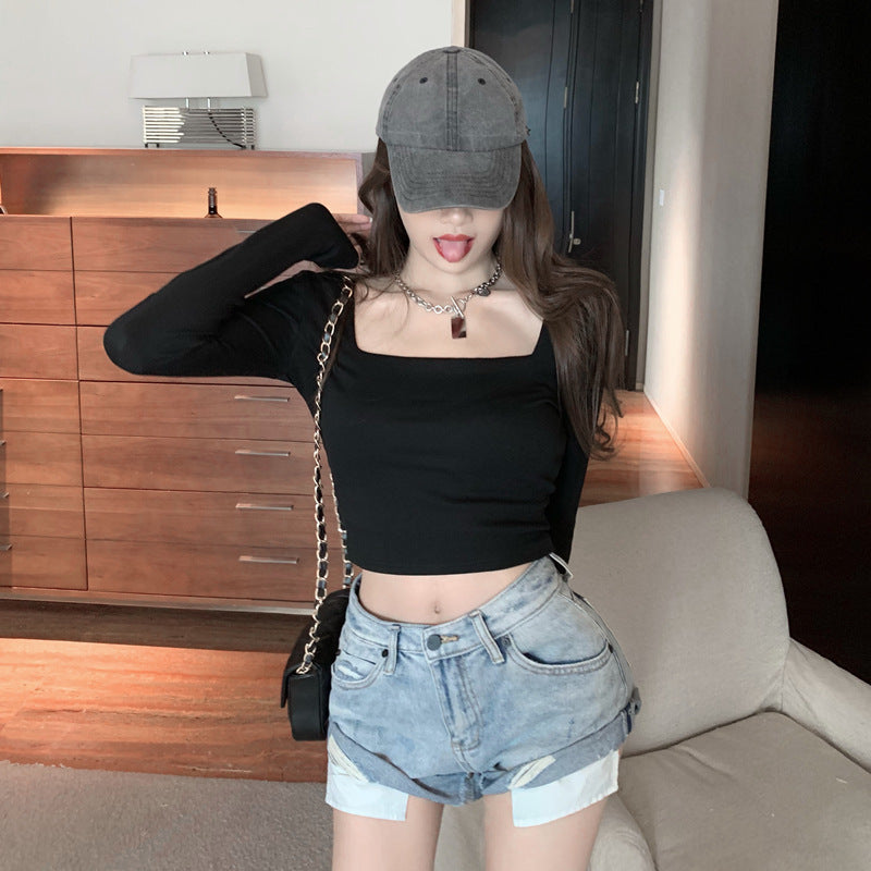 Woman wearing Slim Fit Round Neck Long Sleeve Basic T-Shirt in a casual setting