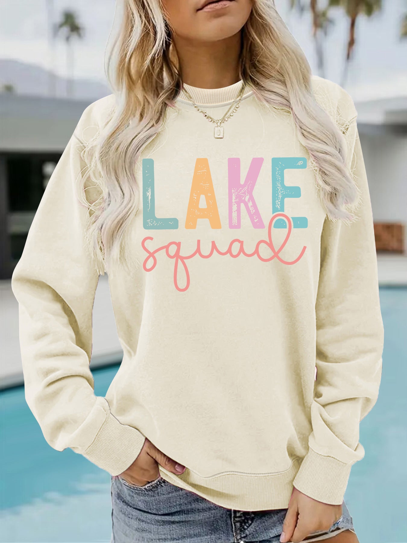 Woman wearing LAKE Printed Hoodie in a casual outdoor setting