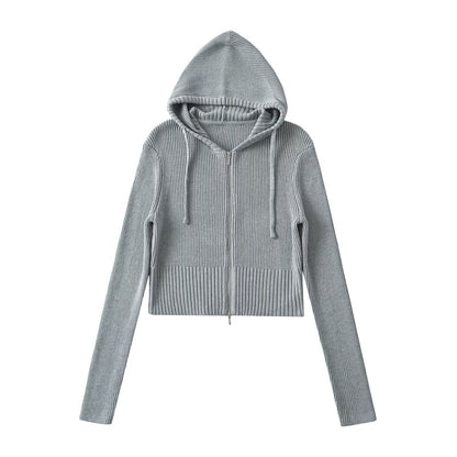 Woman wearing Hooded Half-Zip Slim Fit Sweater in a stylish office setting