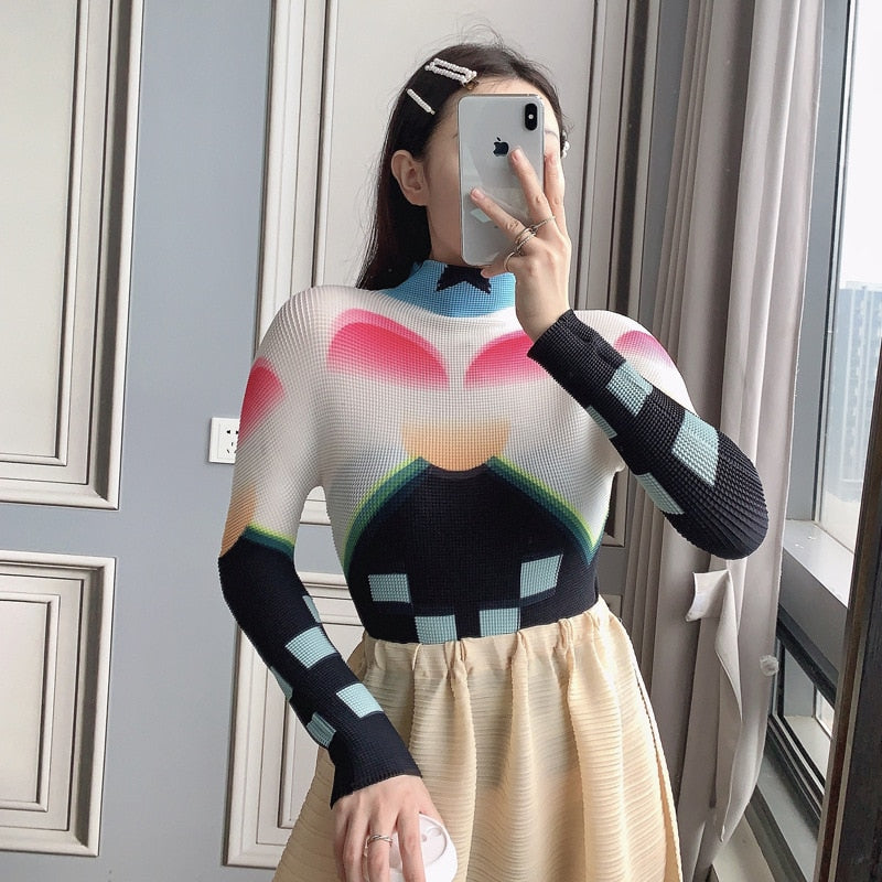 Woman wearing Miyake Pleated Corset Top in a stylish setting