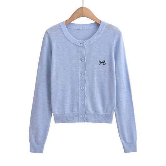Woman wearing Chic Round Neck Long Sleeve Top in a casual setting