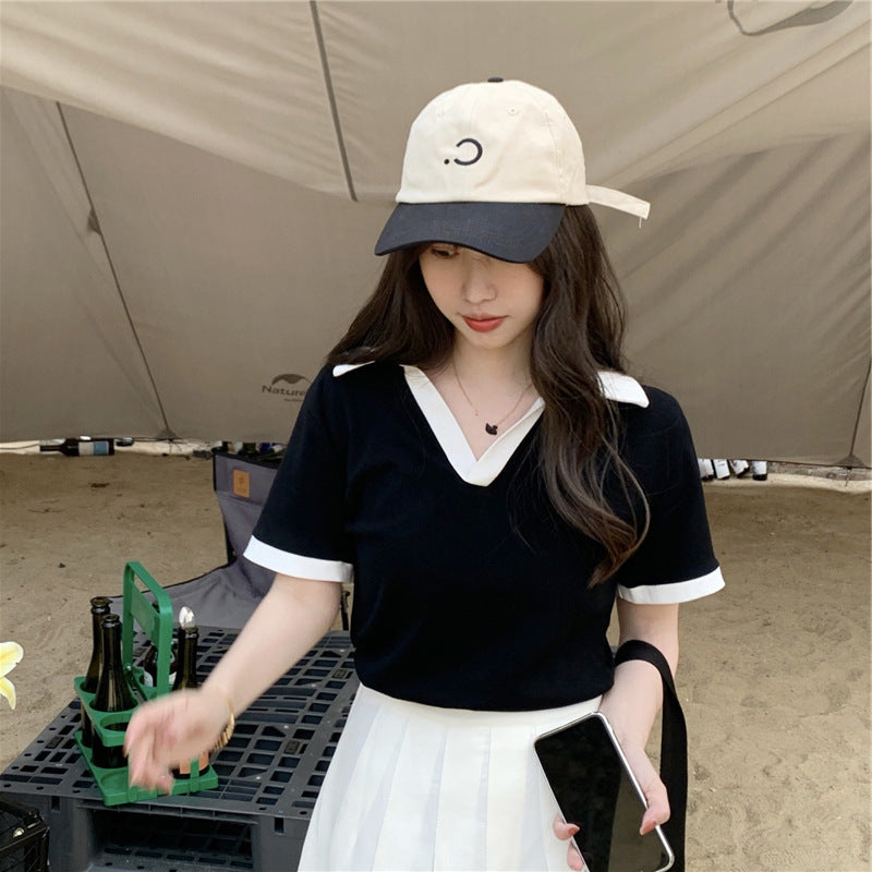 Woman wearing V Neck Short Sleeve Crop Top in a casual setting