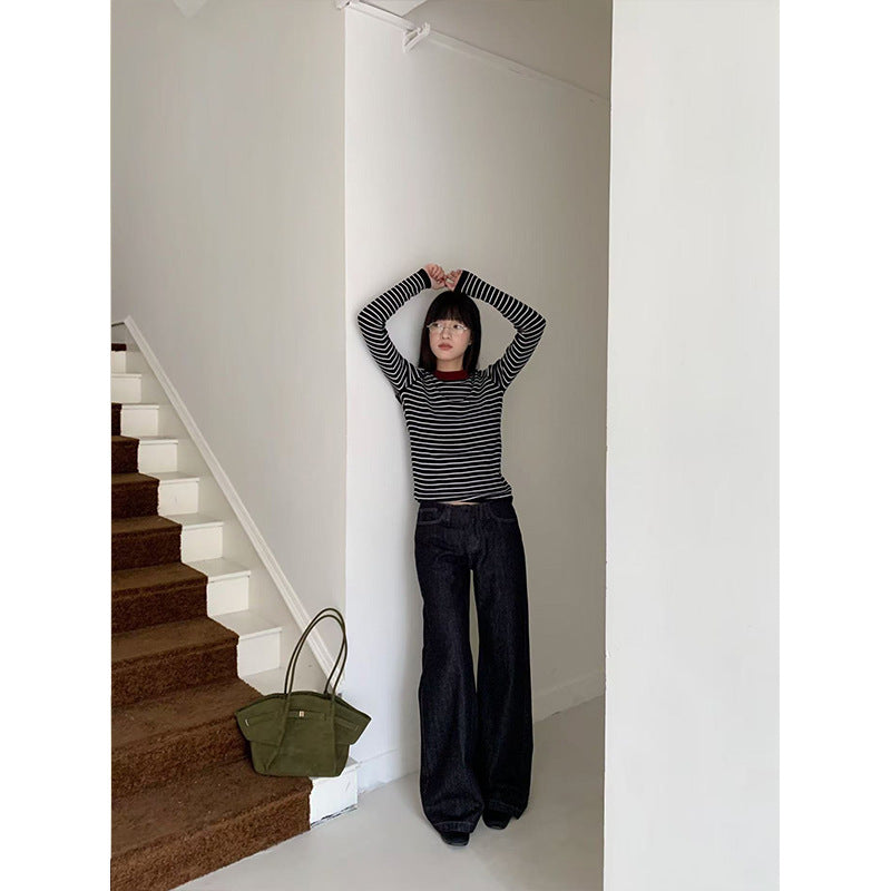 Woman wearing Low Waist Flared Denim Jeans in a casual setting