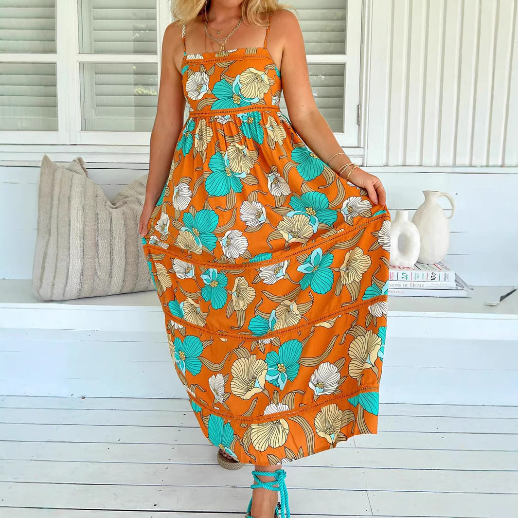 Woman wearing One-Shoulder Leaf Print Boho Maxi Dress in a sunny outdoor setting
