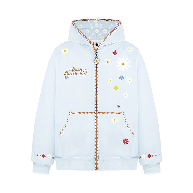 Woman wearing Floral Embroidery Hooded Sweatshirt in a casual setting