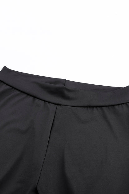 Woman wearing Black Grommet Lace Up Front Leggings in a stylish setting