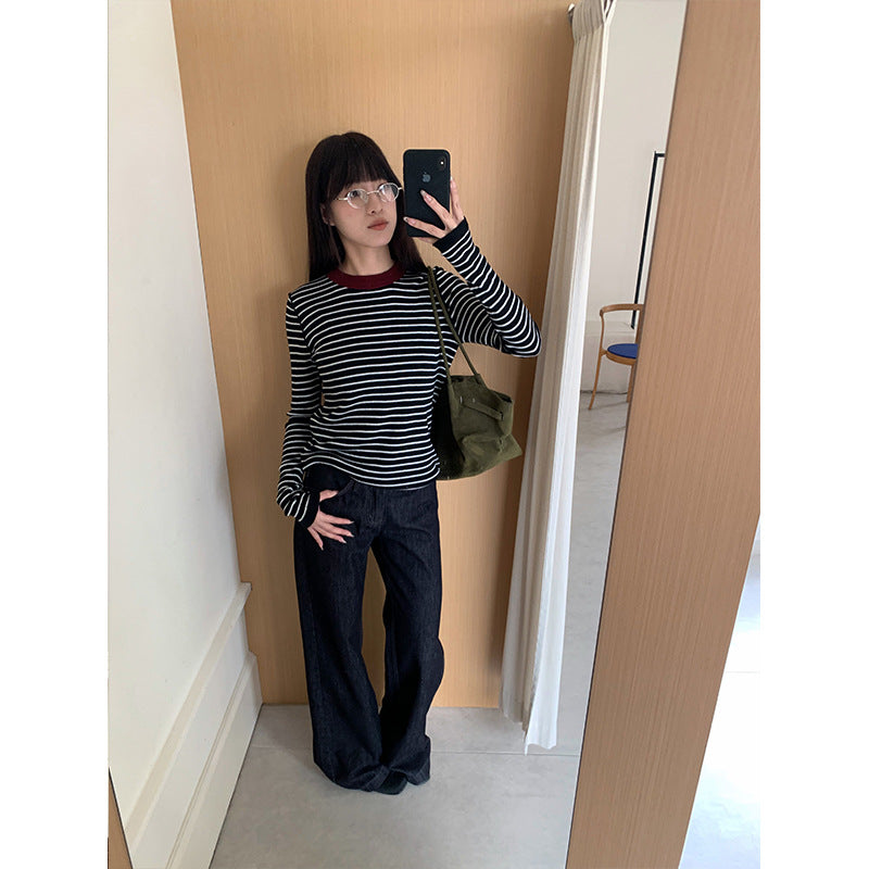 Woman wearing Low Waist Flared Denim Jeans in a casual setting