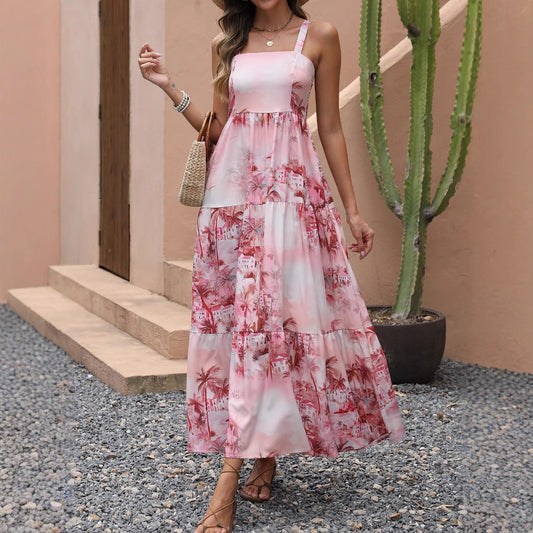 Woman wearing Strapless Coconut Tree Print Boho Beach Maxi Dress in a tropical beach setting