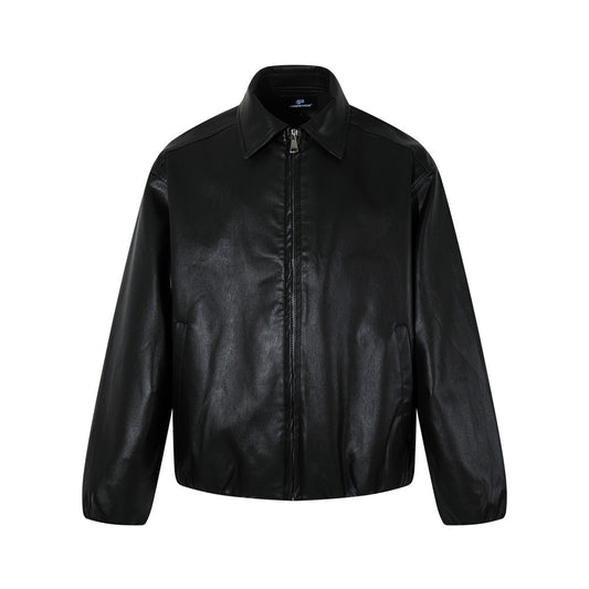 Woman wearing sleek PU leather zip-up jacket in an urban setting