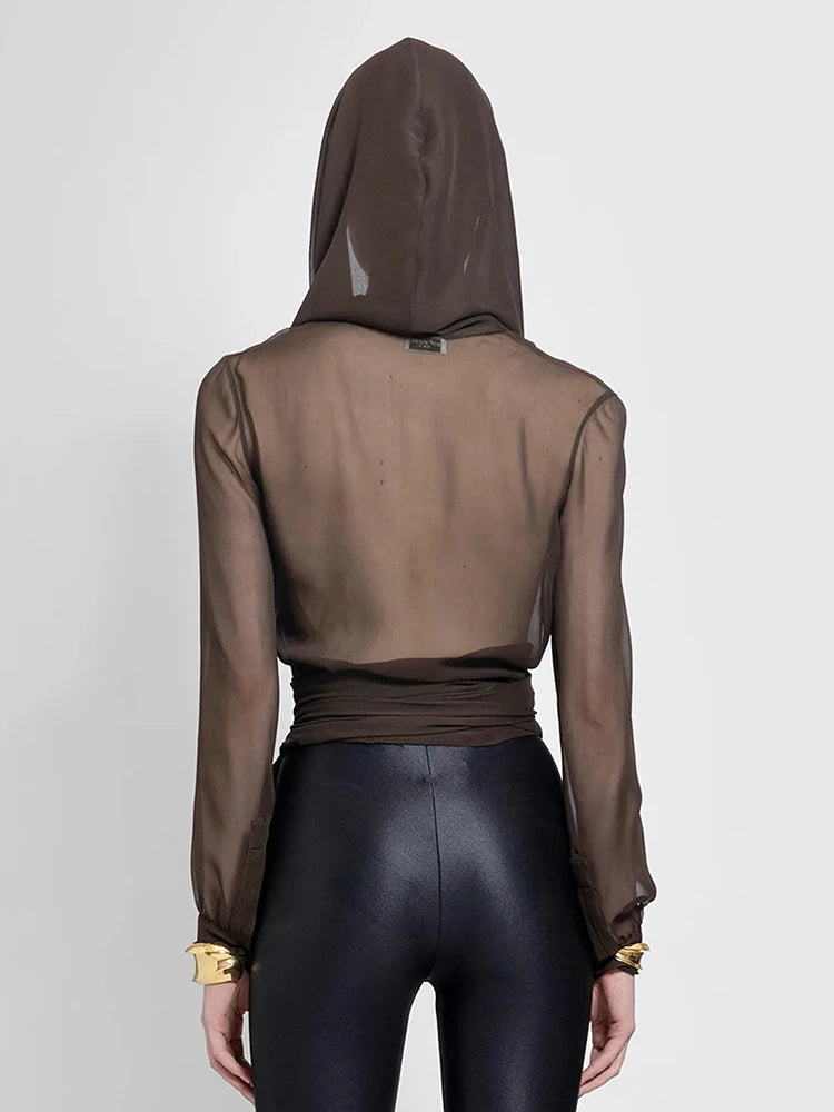 Woman wearing Solid Sheer Mesh Slimming Hooded Shirt in a casual setting