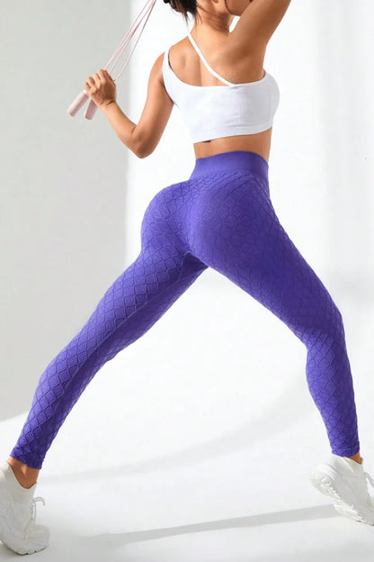 Woman wearing High Waist Active Leggings in a workout setting