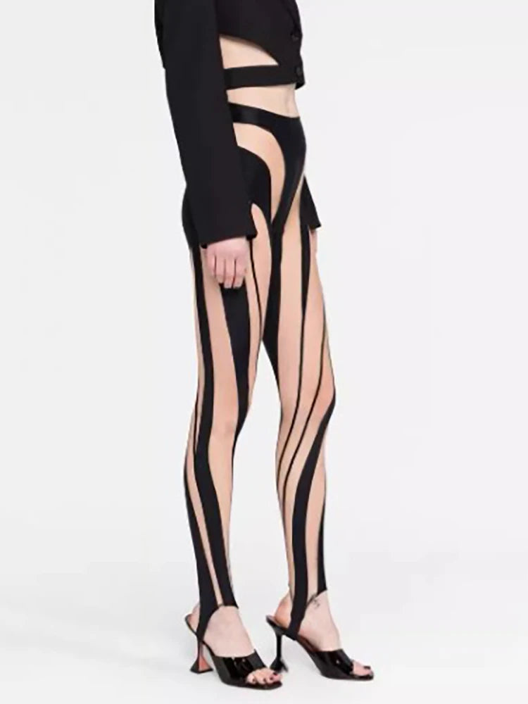 Woman wearing Color Block Mesh Splicing Leggings in an urban setting