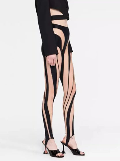 Woman wearing Color Block Mesh Splicing Leggings in an urban setting