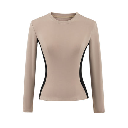 Woman wearing Round Neck Color Block Long Sleeve Top in a casual setting