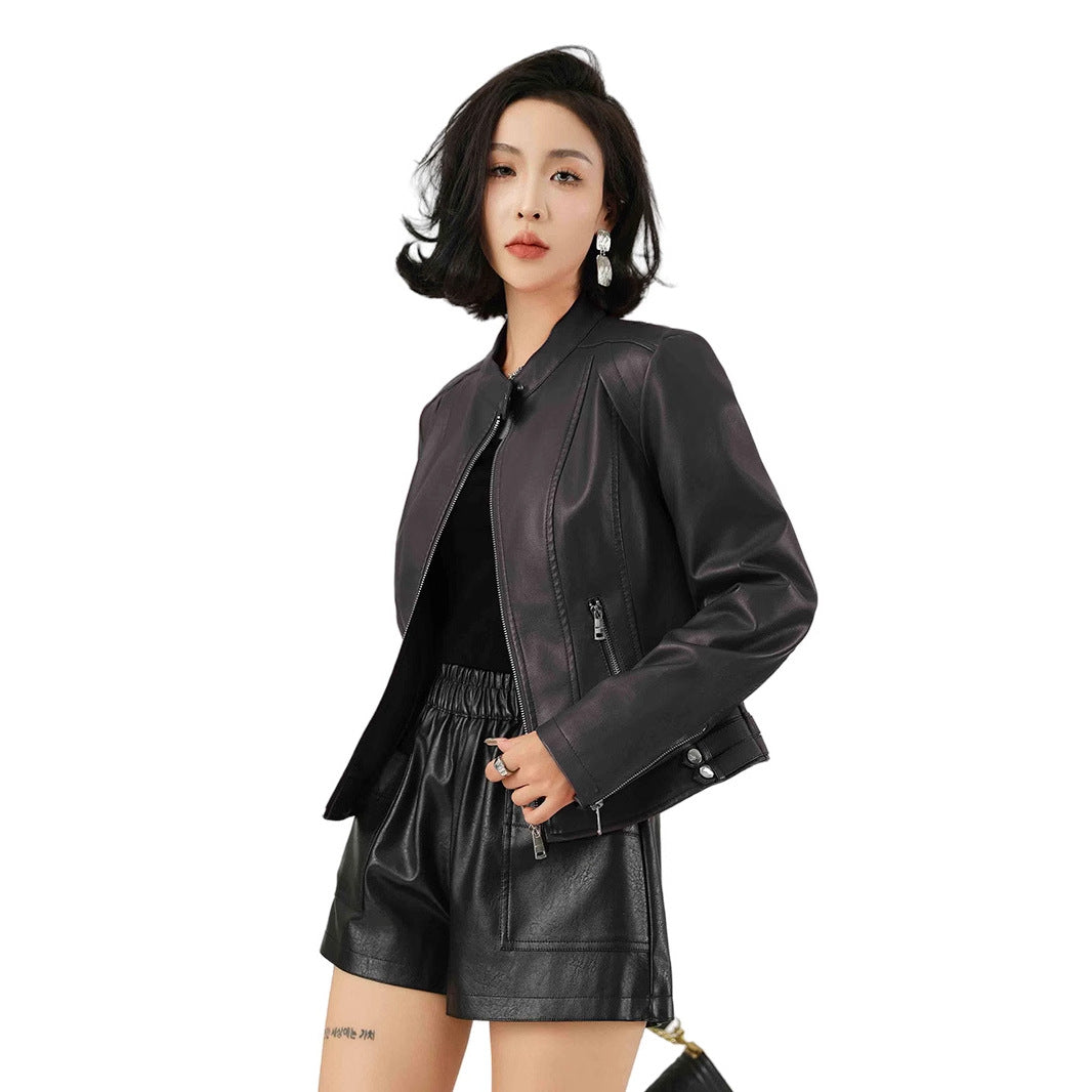 Woman wearing standing collar short jacket in a casual setting
