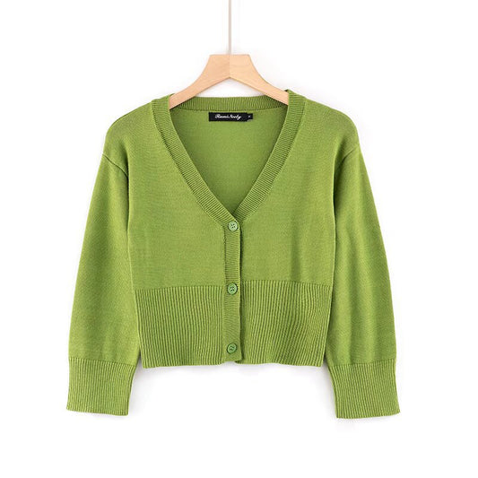 Woman wearing V-Neck Long Sleeve Short Cardigan in a casual setting
