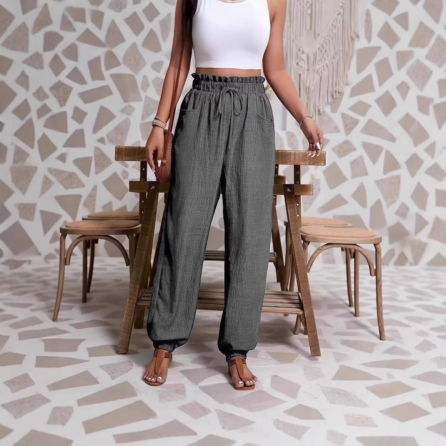 Woman wearing Elastic Solid Color Pants in a casual setting