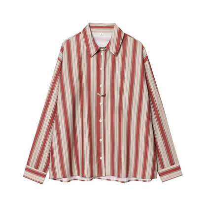 Woman wearing Back Strap Striped Shirt in a casual setting