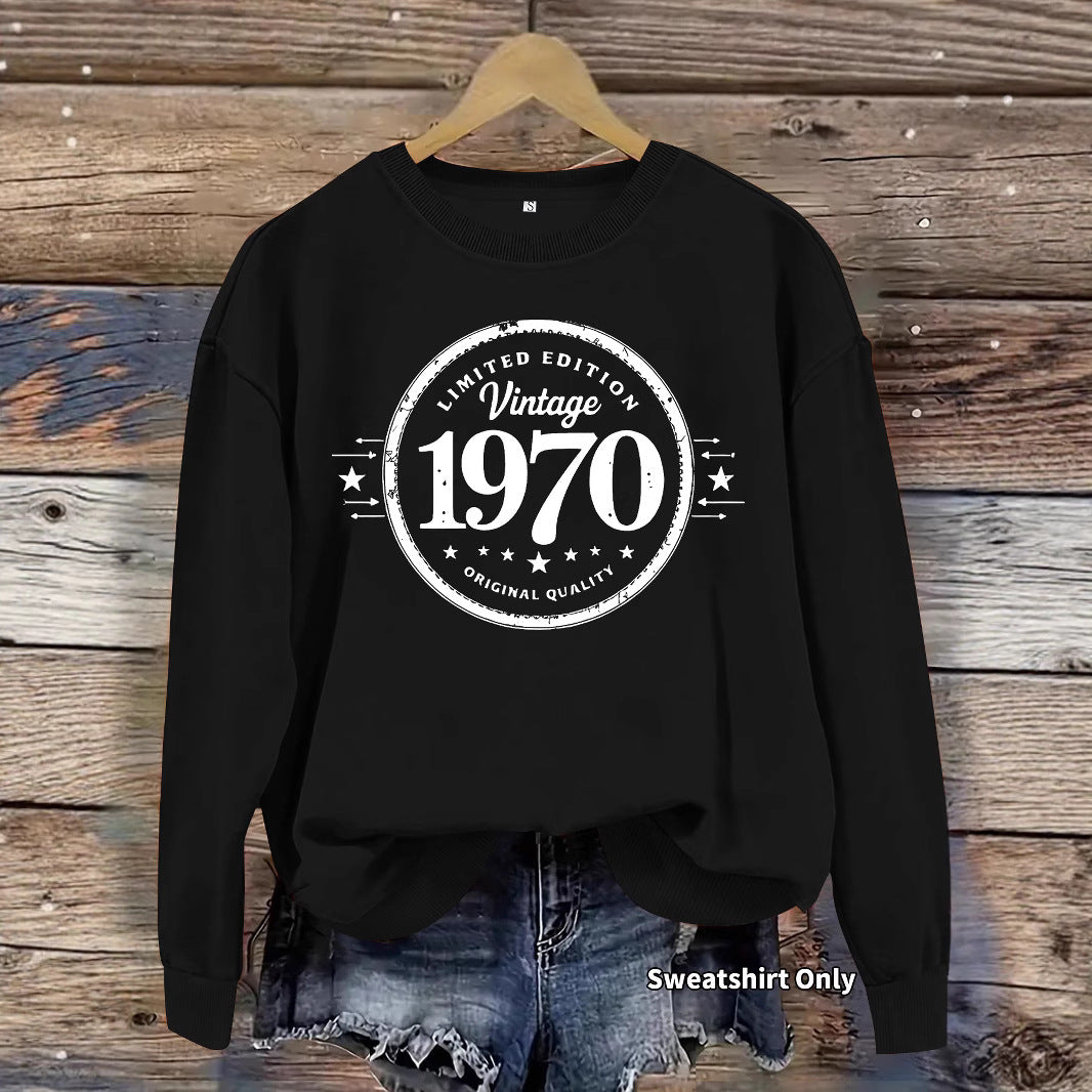 Woman wearing 1970 printed hoodie in a casual outdoor setting