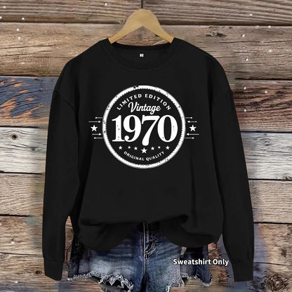 Woman wearing 1970 printed hoodie in a casual outdoor setting