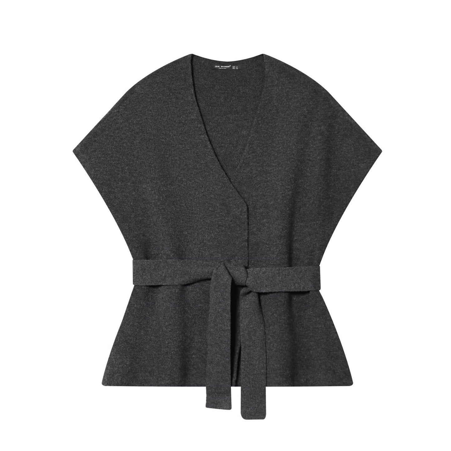 Woman wearing Belted Knitted Vest and Half Skirt Set in a stylish urban setting
