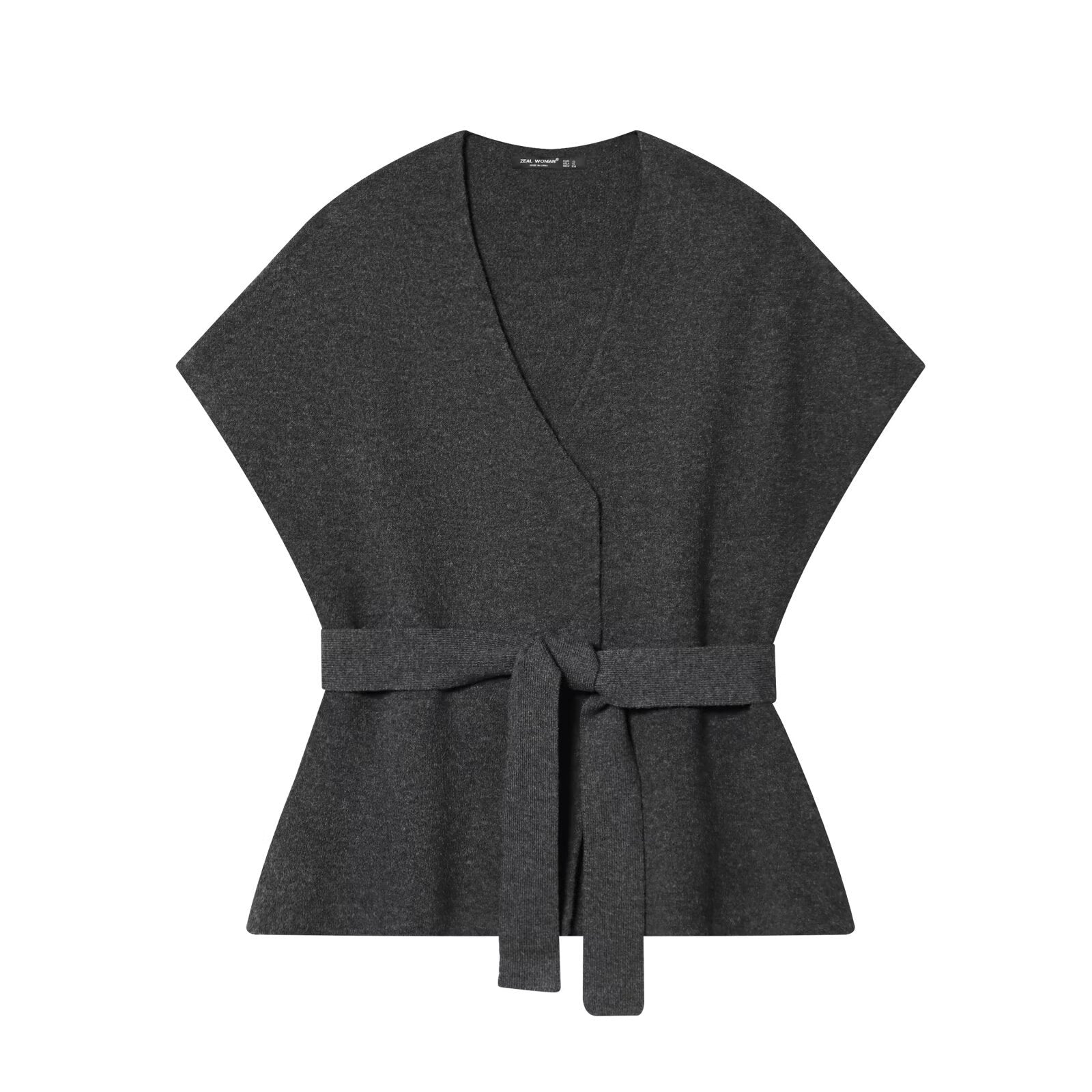Woman wearing Belted Knitted Vest and Half Skirt Set in a stylish urban setting