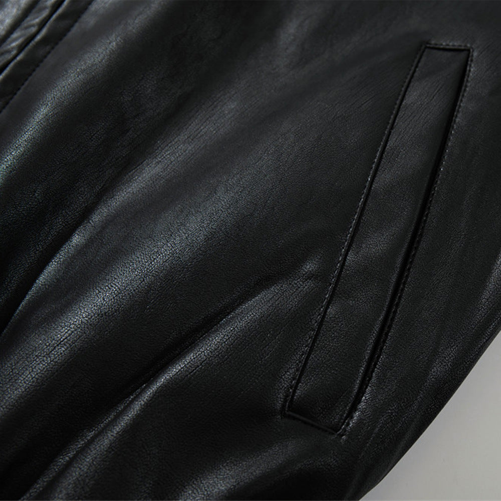 Woman wearing sleek PU leather zip-up jacket in an urban setting