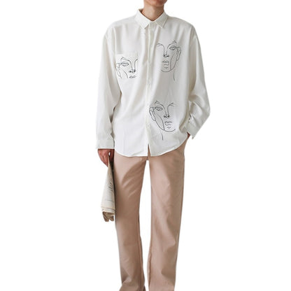 Woman wearing Cotton Face Print Blouse in a summer setting