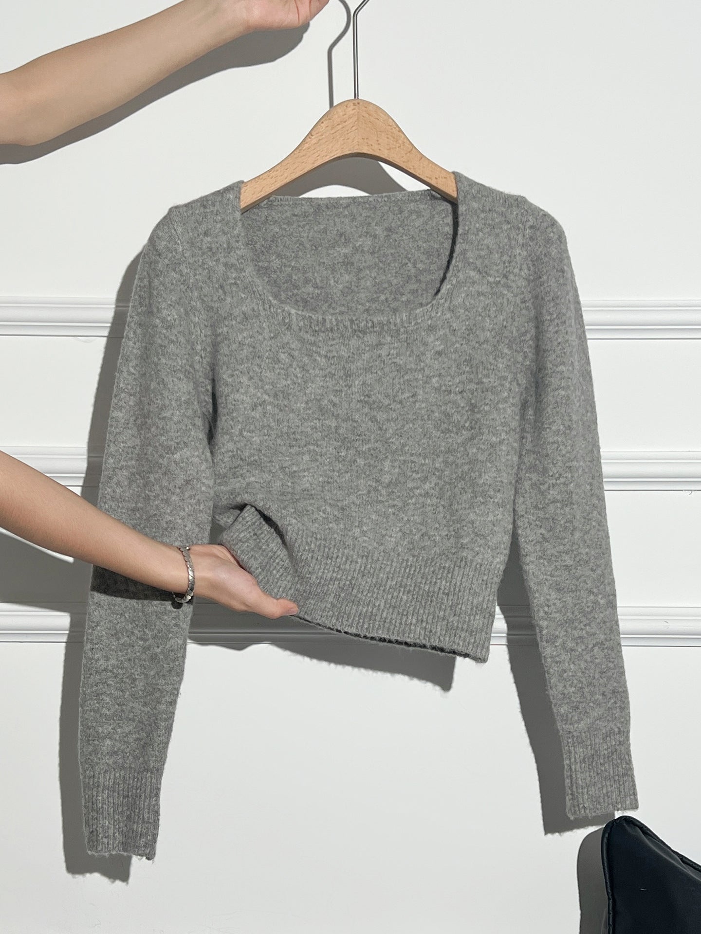 Woman wearing Short Knit Sweater in a casual setting