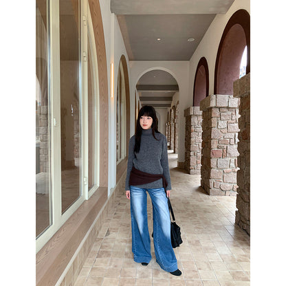 Woman wearing Wide Leg Flare Jeans in a casual outdoor setting