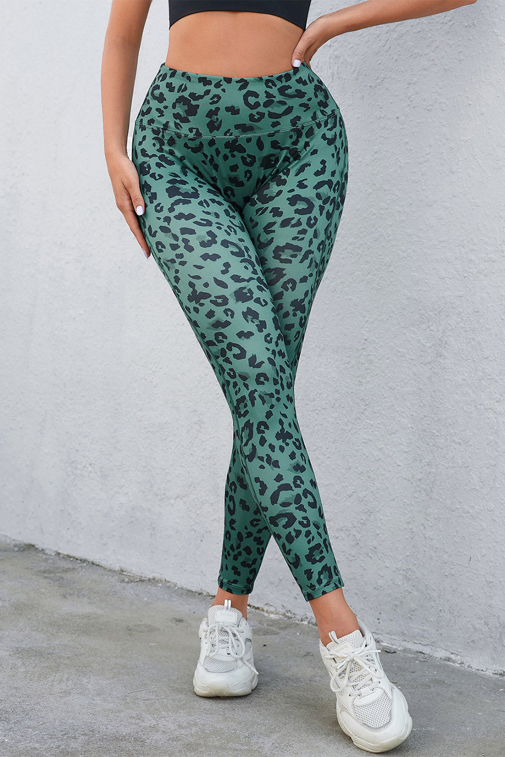 Woman wearing Classic Leopard Print Active Leggings in an urban setting