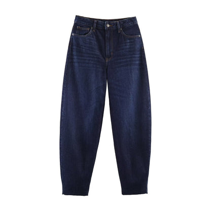 Woman wearing High Waisted Bucket Shaped Jeans in an urban setting