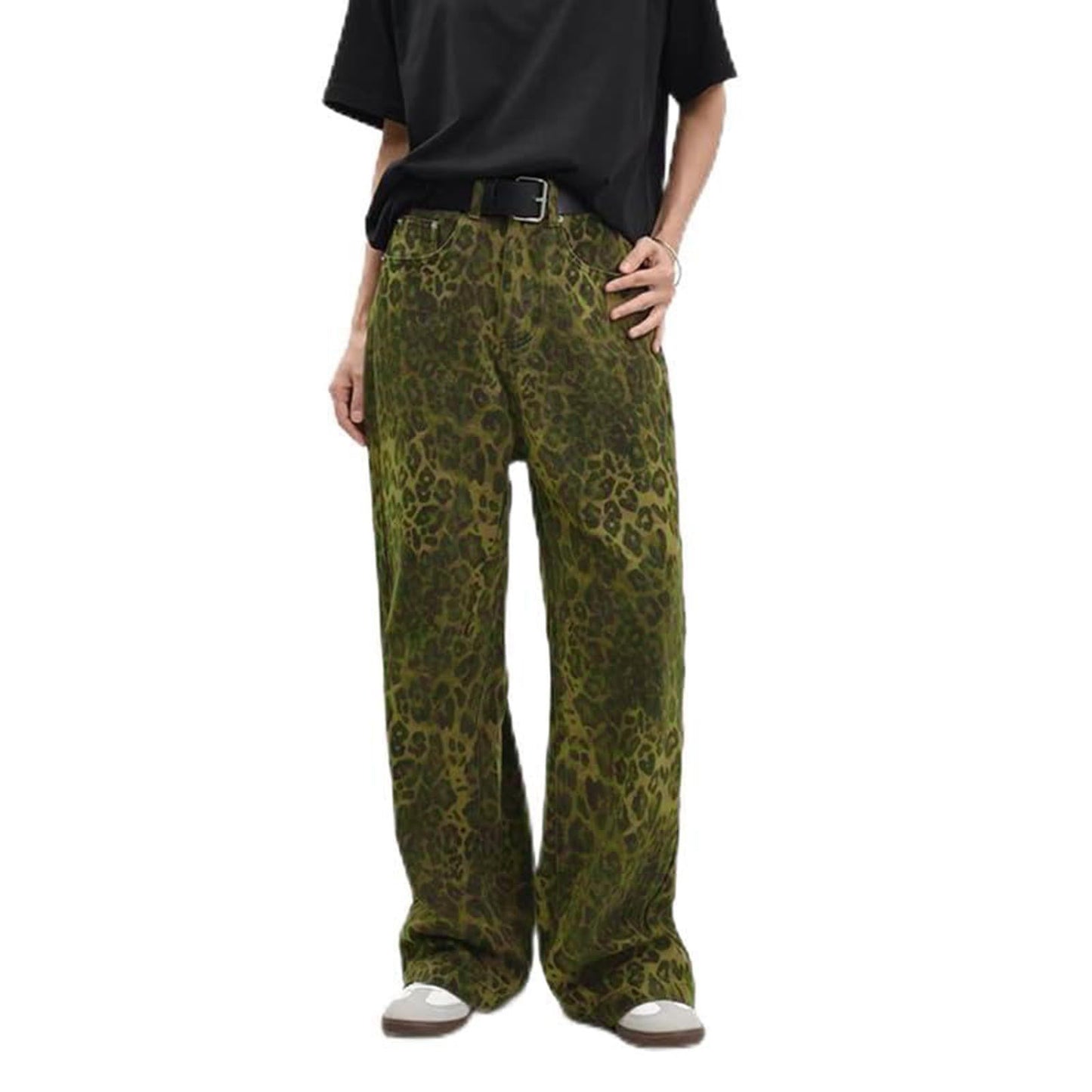 Woman wearing leopard print jeans in a stylish urban setting