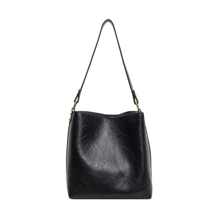 Women's Large Capacity PU Leather Commuter Shoulder Bucket Tote Bag – Model View | TajStylo