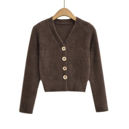 Woman wearing V-Neck Long Sleeve Cardigan Sweater in a chic office setting