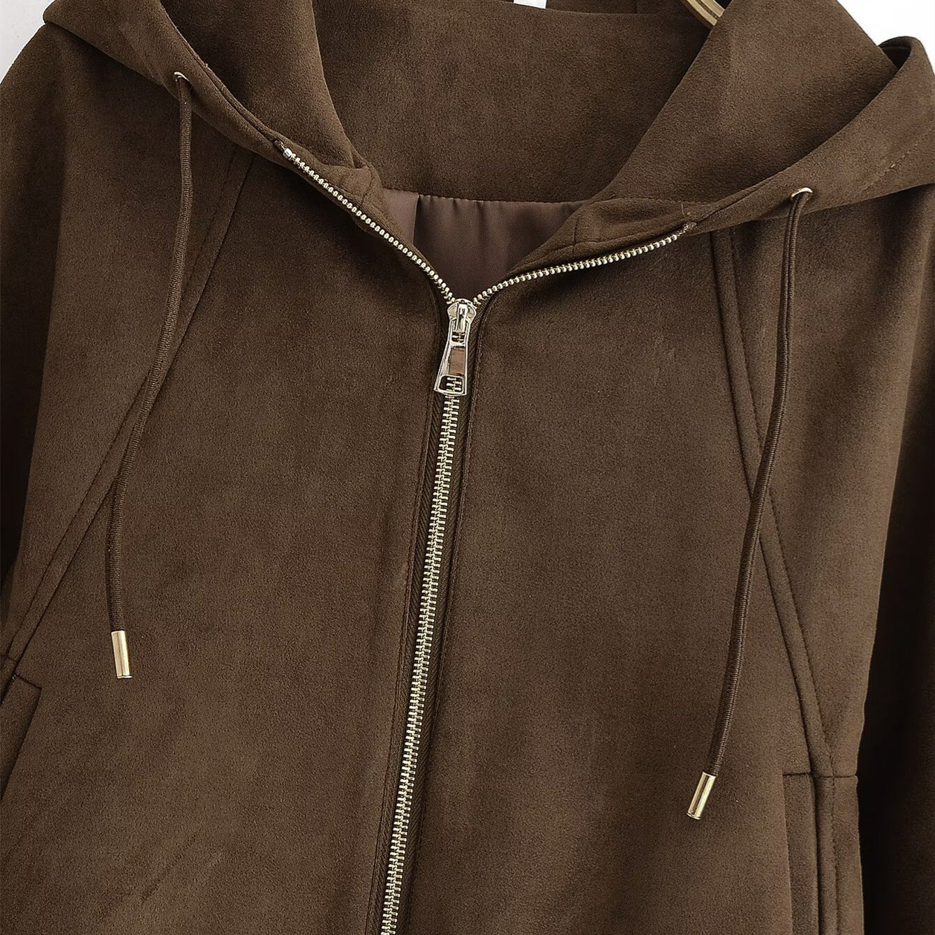 Woman wearing Hooded Suede Look Jacket in an autumn park