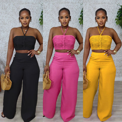 Woman wearing Drawstring Tie-Up Top and High Waist Loose Long Pants Set in a city setting