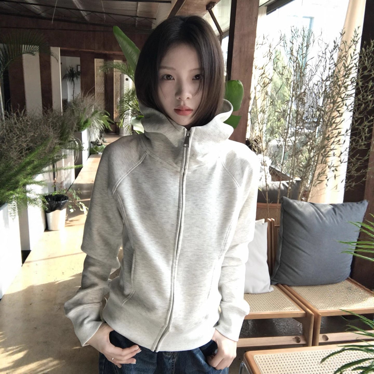 Woman wearing Hooded Sweatshirt for Women in a cozy outdoor setting