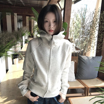 Woman wearing Hooded Sweatshirt for Women in a cozy outdoor setting